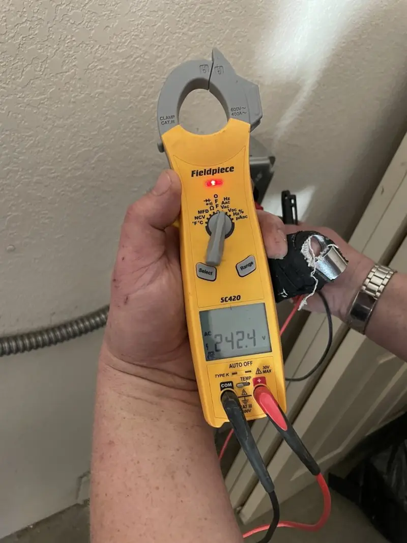 Voltage testing with clamp meter during Aluminum Wiring Replacement in Donora
